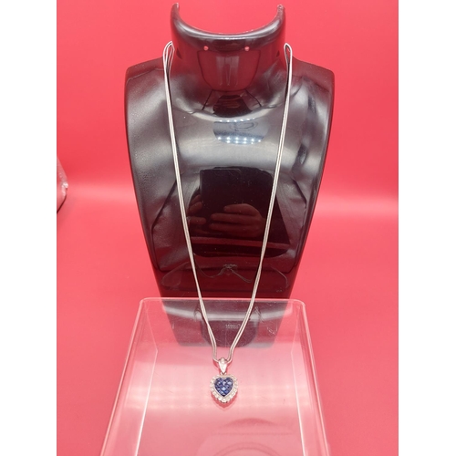 8 - Stunning 18ct white gold diamod and sapphire pendant set in the shape of a heart