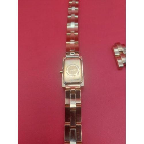 89 - Emporio ladies watch gold tone metal.