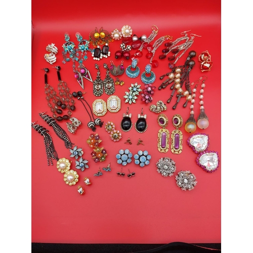 106 - Large collection of over 30 pairs of vintage earrings