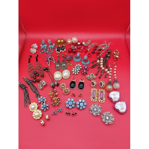 106 - Large collection of over 30 pairs of vintage earrings