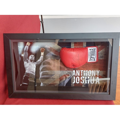 224 - Anthony Joshua signed boxing glove 77cm length 47cm high with authenticity certificate