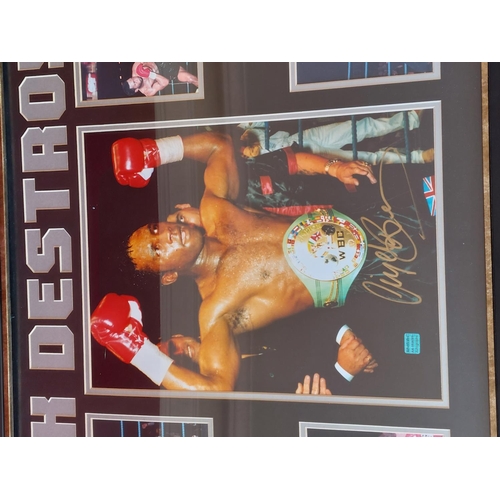 225 - Nigel Benn The Dark Destroyer signed and framed boxing montage. Length 93cm Height 63 cm. With authe... 