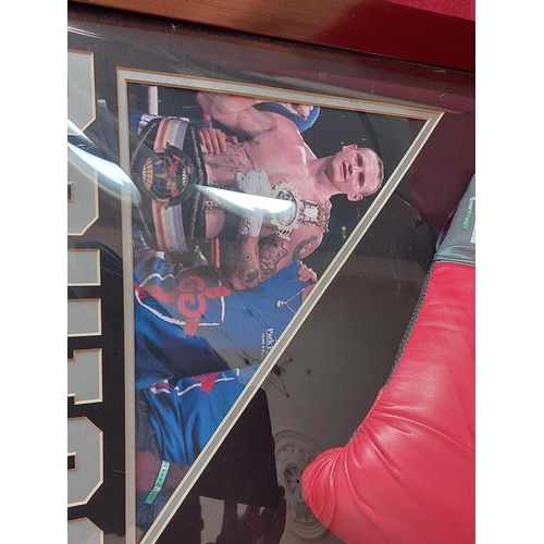 229 - Carl Froch and George Groves signed gloves and boxing montage with plastic convex cover. Length 90cm... 