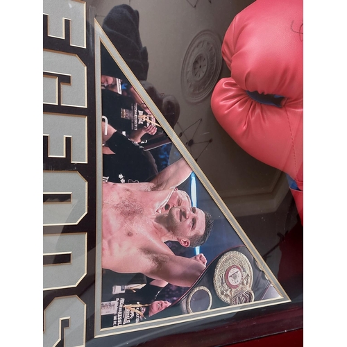 229 - Carl Froch and George Groves signed gloves and boxing montage with plastic convex cover. Length 90cm... 