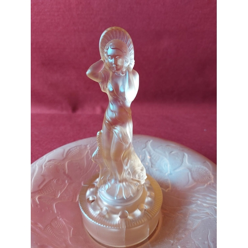 296 - Glass peach coloured art deco style female figure in bowl. A/F