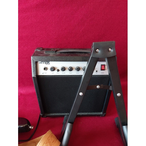 300 - Electric guitar with stand and amp.