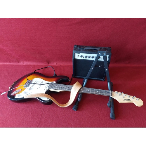 300 - Electric guitar with stand and amp.