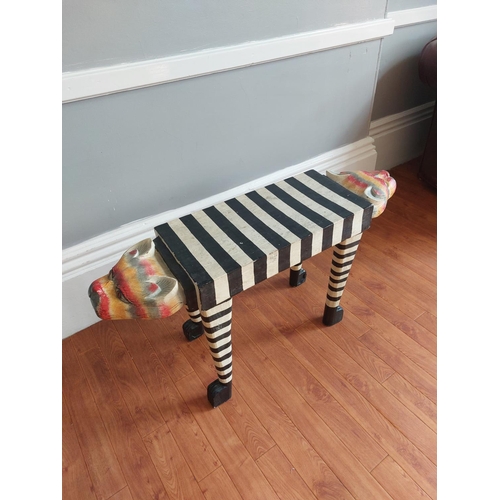 306 - Very unusual stool with Zebra pattern body and cats heads at each end. L 40