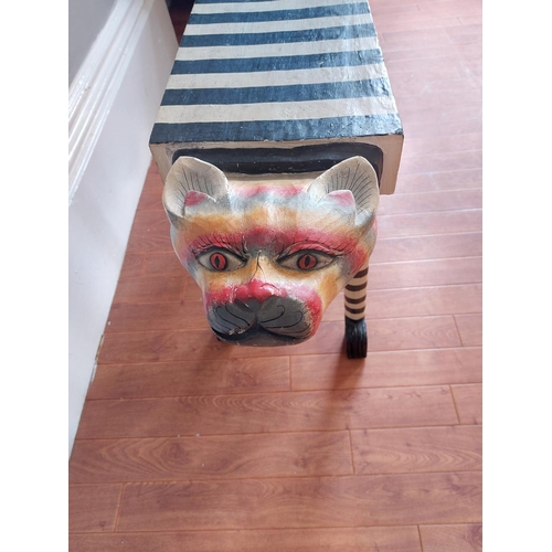 306 - Very unusual stool with Zebra pattern body and cats heads at each end. L 40