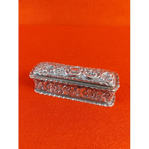 102 - 1902 Silver Chester hallmarked trinket box. Heavily engraved 9.5cm length 3cm height