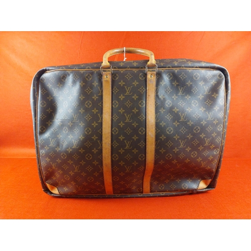 177 - Authentic Louis Vuitton Sirius 65 Monogram soft sided suitcase/travel bag. Serial number SP0932. Con... 