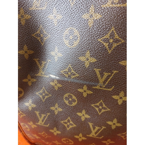 177 - Authentic Louis Vuitton Sirius 65 Monogram soft sided suitcase/travel bag. Serial number SP0932. Con... 