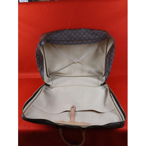 177 - Authentic Louis Vuitton Sirius 65 Monogram soft sided suitcase/travel bag. Serial number SP0932. Con... 