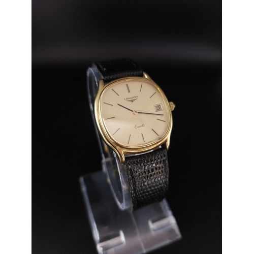 22 - Mens 9ct gold Longines watch, tear to strap