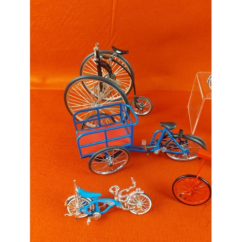 249 - Collection of 4 metal pedal bikes & 4 plastic miniature American style bikes approx 3.5