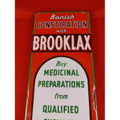 265 - Brooklax Chemists enamel advertising sign. Mounted onto a wooden back 22.5 