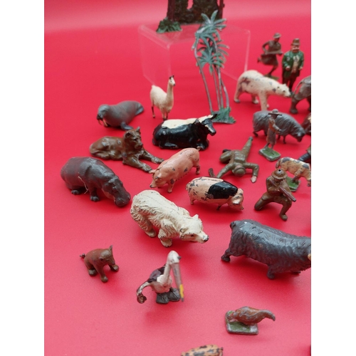 312 - Collection of lead and tin figures and animals.