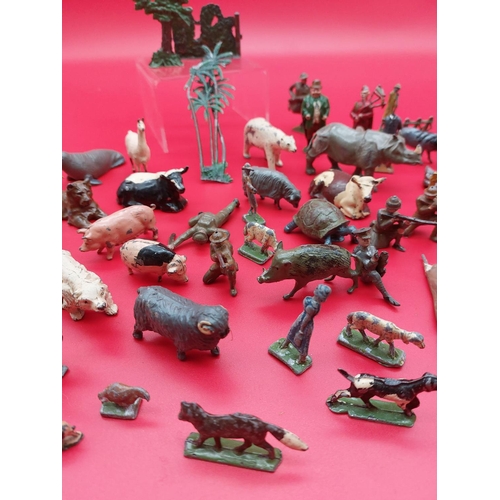 312 - Collection of lead and tin figures and animals.