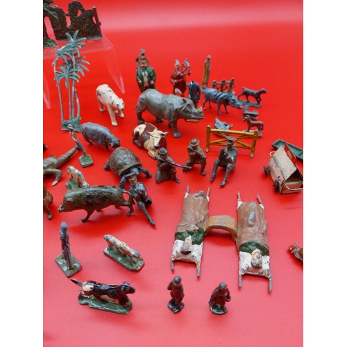 312 - Collection of lead and tin figures and animals.