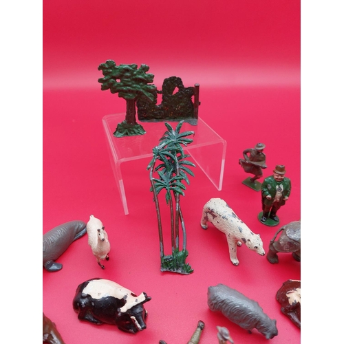 312 - Collection of lead and tin figures and animals.