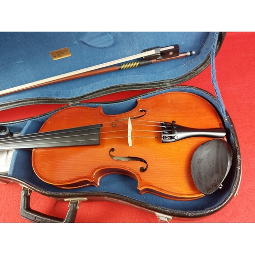 323 - Skylark Brand violin with case.