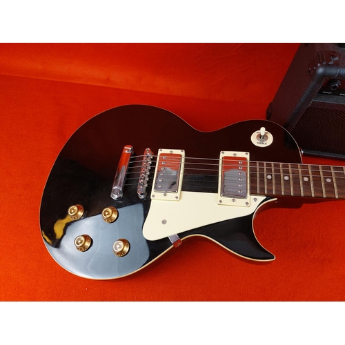 325 - Encore electric guitar with Kinsman amp.