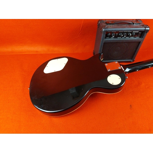 325 - Encore electric guitar with Kinsman amp.