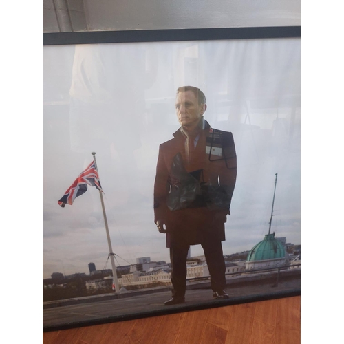 340 - Large framed 007 James Bond photograph. Daniel Craig on the rooftop of the Cabinet of War Rooms, dur... 