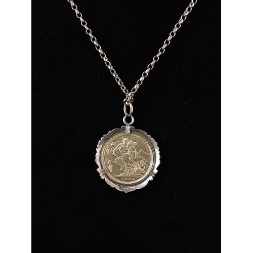 44 - 1892 Melbourne mint full sovereign in 9ct gold mount and 9ct gold chain. Length 56cm 18.1 grams