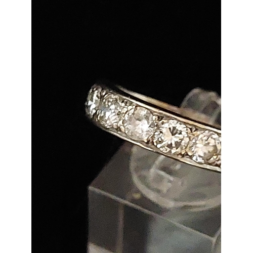 58 - 18ct white gold half eternity diamond ring. 7 Diamonds in total each at 0.25 carat. Centeral diamond... 