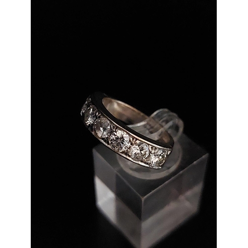 58 - 18ct white gold half eternity diamond ring. 7 Diamonds in total each at 0.25 carat. Centeral diamond... 