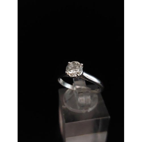 59 - 18ct white gold solitaire 0.70 carat. Weight 3.2 grams, size O