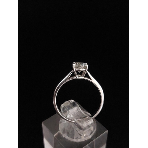 59 - 18ct white gold solitaire 0.70 carat. Weight 3.2 grams, size O