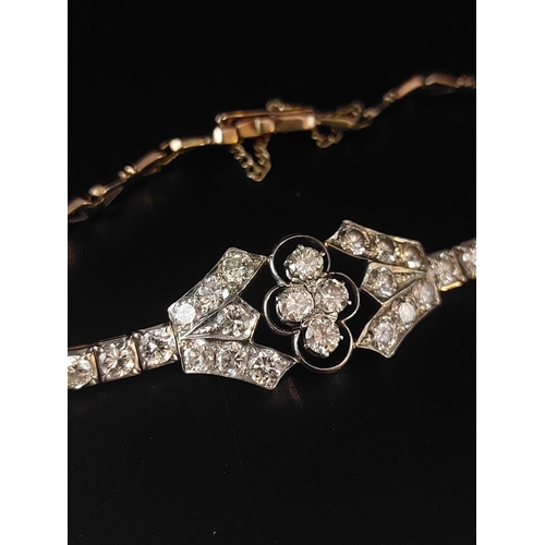 62 - Very attractive 18ct gold Art Deco diamond cocktail bracelet featuring 26 0.12 diamonds. 3.12 carat ... 