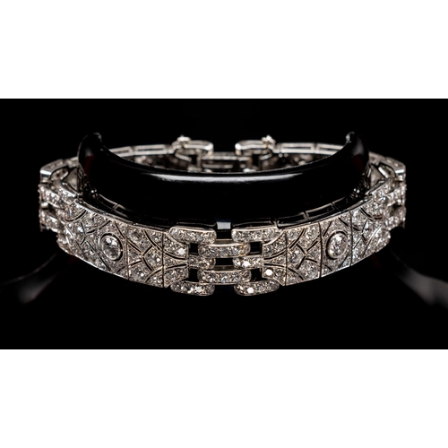 65 - A very beautiful and elegant Art Deco Tiffany & Co London diamond panel bracelet circa 1930's. Set i... 