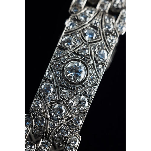 65 - A very beautiful and elegant Art Deco Tiffany & Co London diamond panel bracelet circa 1930's. Set i... 