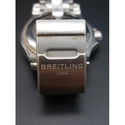 85 - Mens Breitling Superocean II 44 watch with original paperwork and box. Watch in good working order.