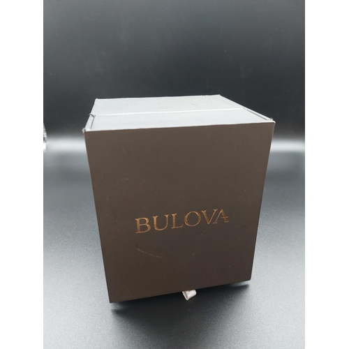 89 - Bulova mens wristwatch gold tone unused.