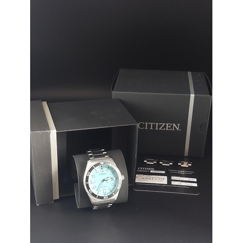 91 - Citizen Eco Drive AW1760-81W Mens watch with turquoise dial.