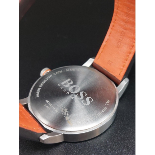 93 - Hugo Boss Orange mens stainless steel watch with leather strap.