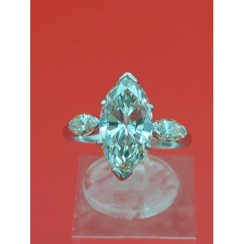 73 - Ladies stunning 3 carat Marquise centre diamond being set with a further .30 approx diamond on each ... 