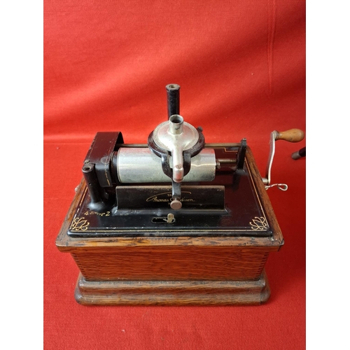 109 - Thomas Edison Fireside model A No. 19037 phonograph. In oak case and black metal horn also marked Th... 