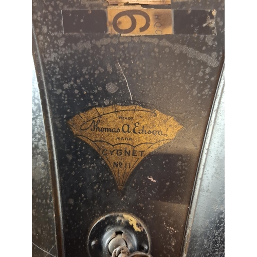 109 - Thomas Edison Fireside model A No. 19037 phonograph. In oak case and black metal horn also marked Th... 