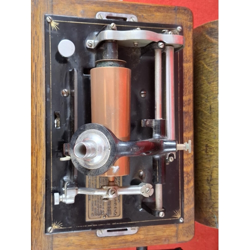 110 - Thomas Edison Type 2 Standard No. S81793 phonograph. In oak case, original lid and twin metal horn. ... 