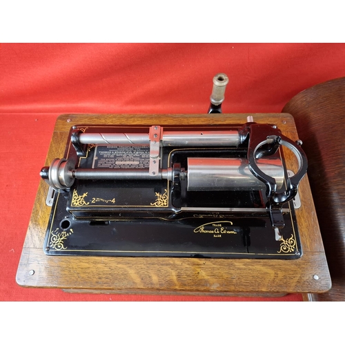 111 - Thomas Edison Triumph model F No. 89974 phonograph. In oak case and original lid. Top section in ver... 