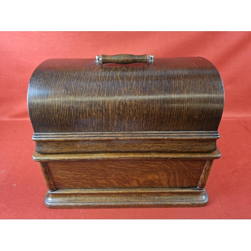 111 - Thomas Edison Triumph model F No. 89974 phonograph. In oak case and original lid. Top section in ver... 