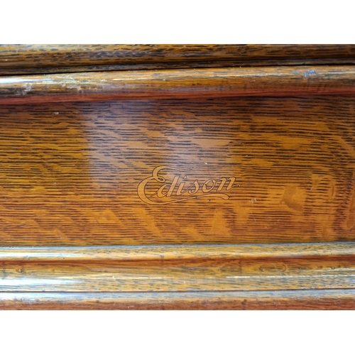 111 - Thomas Edison Triumph model F No. 89974 phonograph. In oak case and original lid. Top section in ver... 