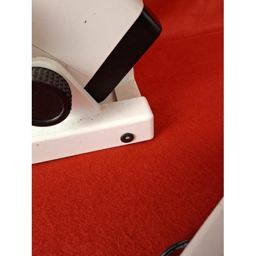 146 - 2 scientific microscopes. Maybe optical. One has wire.