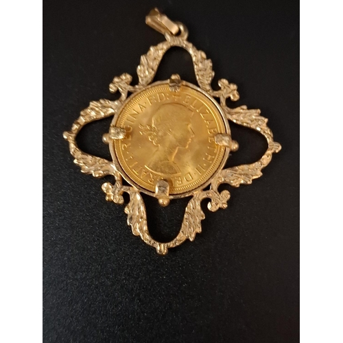 19 - Full sovereign dated 1965 in 9ct gold mount 16.2 grams