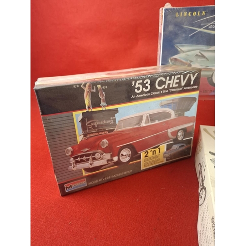 309 - Collection of model kit cars and motorbike by Monogram and Revell